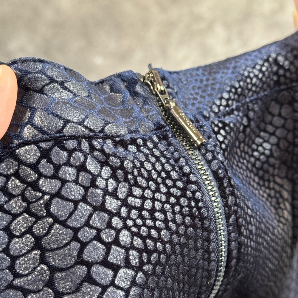 Blue snake-skin Peplum crisscross detail. 💲⬇️